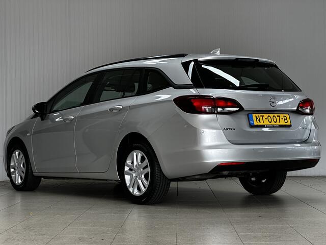 Opel ASTRA Sports Tourer 1.0 Online Edition/ LED Dagrijverl./ DAB+/ Apple+Android/ Clima/ Navi/ Cruise/ Bluetooth/ Multi.LEDER.Stuur/ Elek.Pakket/ Isofix/ PDC V+A.