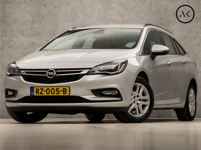 Opel ASTRA Sports Tourer 1.0 Sport+ (APPLE CARPLAY, GROOT NAVI, CRUISE, SPORTSTOELEN, PARKEERSENSOREN, DAB+, TREKHAAK, ELEK PAKKET, NIEUWE APK, NIEUWSTAAT)