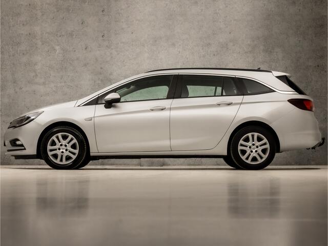 Opel ASTRA Sports Tourer 1.0 Sport+ (APPLE CARPLAY, GROOT NAVI, CRUISE, SPORTSTOELEN, PARKEERSENSOREN, DAB+, TREKHAAK, ELEK PAKKET, NIEUWE APK, NIEUWSTAAT)