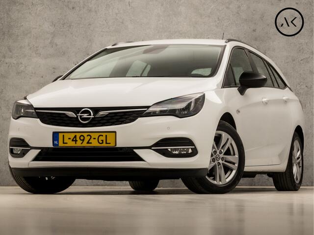 Opel ASTRA Sports Tourer 1.4 Turbo Sport 146Pk Automaat (APPLE CARPLAY, NAVIGATIE, CAMERA, CRUISE, PARKEERSENSOREN, SPORTSTOELEN, LED KOPLAMPEN, TREKHAAK, NIEUWE APK, NIEUWSTAAT)