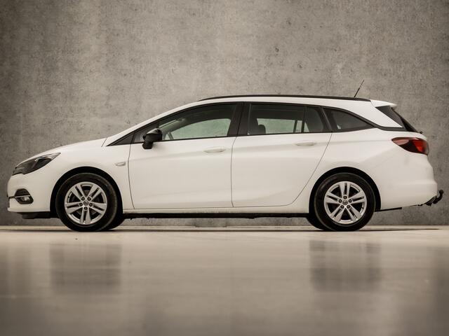Opel ASTRA Sports Tourer 1.4 Turbo Sport 146Pk Automaat (APPLE CARPLAY, NAVIGATIE, CAMERA, CRUISE, PARKEERSENSOREN, SPORTSTOELEN, LED KOPLAMPEN, TREKHAAK, NIEUWE APK, NIEUWSTAAT)