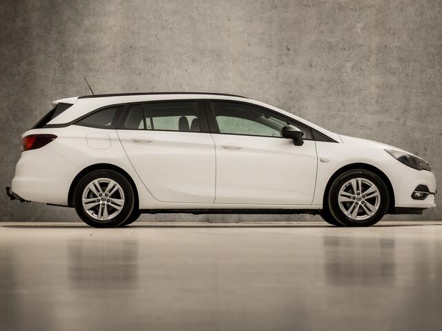 Opel ASTRA Sports Tourer 1.4 Turbo Sport 146Pk Automaat (APPLE CARPLAY, NAVIGATIE, CAMERA, CRUISE, PARKEERSENSOREN, SPORTSTOELEN, LED KOPLAMPEN, TREKHAAK, NIEUWE APK, NIEUWSTAAT)