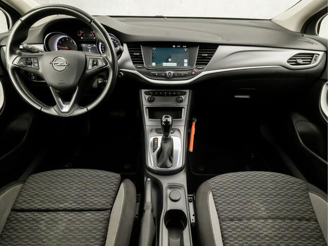 Opel ASTRA Sports Tourer 1.4 Turbo Sport 146Pk Automaat (APPLE CARPLAY, NAVIGATIE, CAMERA, CRUISE, PARKEERSENSOREN, SPORTSTOELEN, LED KOPLAMPEN, TREKHAAK, NIEUWE APK, NIEUWSTAAT)