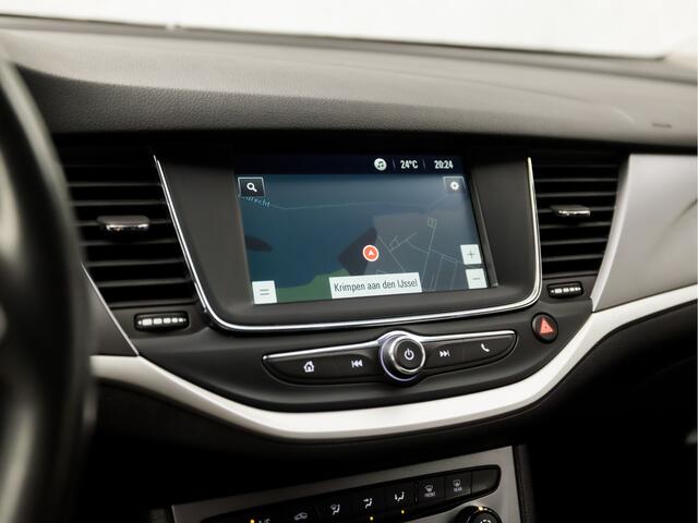 Opel ASTRA Sports Tourer 1.4 Turbo Sport 146Pk Automaat (APPLE CARPLAY, NAVIGATIE, CAMERA, CRUISE, PARKEERSENSOREN, SPORTSTOELEN, LED KOPLAMPEN, TREKHAAK, NIEUWE APK, NIEUWSTAAT)