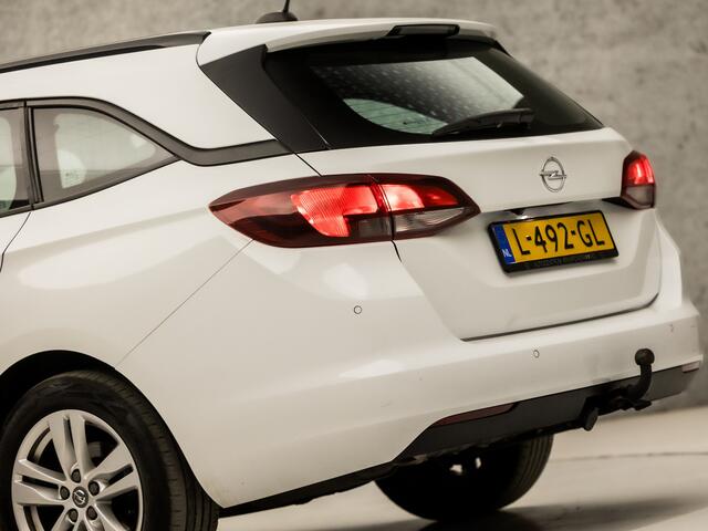 Opel ASTRA Sports Tourer 1.4 Turbo Sport 146Pk Automaat (APPLE CARPLAY, NAVIGATIE, CAMERA, CRUISE, PARKEERSENSOREN, SPORTSTOELEN, LED KOPLAMPEN, TREKHAAK, NIEUWE APK, NIEUWSTAAT)