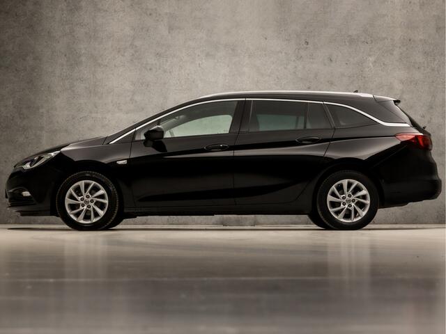 Opel ASTRA Sports Tourer 1.4 Innovation 150Pk (APPLE CARPLAY, GROOT NAVI, CLIMATE, CAMERA, GETINT GLAS, LEDER, SPORTSTOELEN, KEYLESS, LED KOPLAMPEN, LANE ASSIST, NIEUWSTAAT)