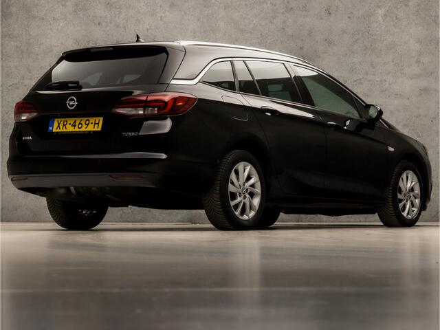 Opel ASTRA Sports Tourer 1.4 Innovation 150Pk (APPLE CARPLAY, GROOT NAVI, CLIMATE, CAMERA, GETINT GLAS, LEDER, SPORTSTOELEN, KEYLESS, LED KOPLAMPEN, LANE ASSIST, NIEUWSTAAT)