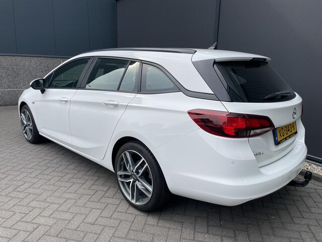 Opel ASTRA Sports Tourer 1.0 Turbo Online Edition Airco - Cruise control - Parkeersensoren achter - Licht metalen velgen 18 inch - Navigatie - Lederen stuurwiel