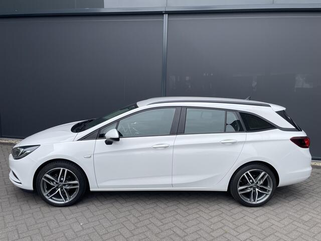 Opel ASTRA Sports Tourer 1.0 Turbo Online Edition Airco - Cruise control - Parkeersensoren achter - Licht metalen velgen 18 inch - Navigatie - Lederen stuurwiel