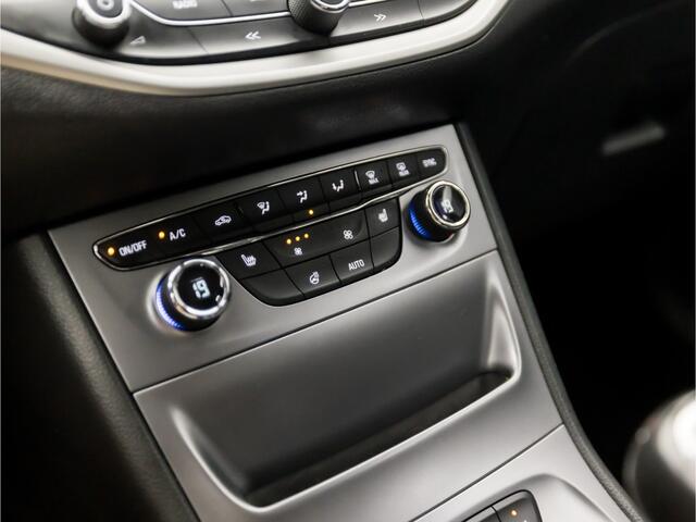 Opel ASTRA Sports Tourer 1.4 Sport 150Pk (APPLE CARPLAY, GROOT NAVI, CLIMATE, STUUR/STOELVERWARMING, SPORTSTOELEN, CAMERA, TREKHAAK, PARKEERSENSOREN, NIEUWSTAAT)