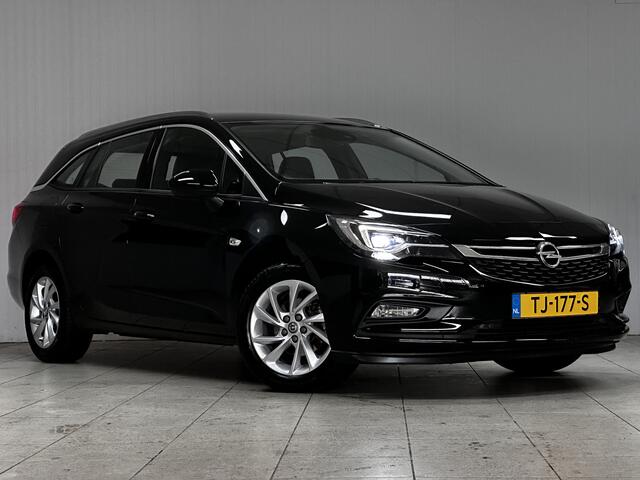 Opel ASTRA Sports Tourer 1.0 Innovation/ Half-Leder/ LED Koplampen/ Keyless/ Apple + Android/ Lane-Assist./ DAB+/ Grootlicht Assist./ 16'' LMV/ Navi/ Clima/ Cruise/ Bluetooth/ Multi. LEDER. Stuur/ PDC V+A.