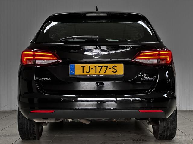 Opel ASTRA Sports Tourer 1.0 Innovation/ Half-Leder/ LED Koplampen/ Keyless/ Apple + Android/ Lane-Assist./ DAB+/ Grootlicht Assist./ 16'' LMV/ Navi/ Clima/ Cruise/ Bluetooth/ Multi. LEDER. Stuur/ PDC V+A.