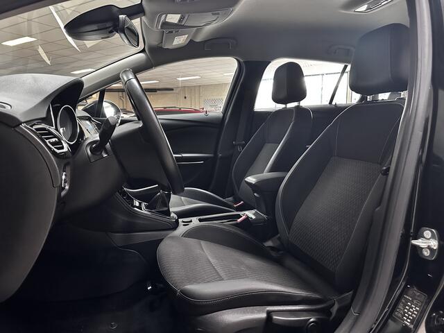Opel ASTRA Sports Tourer 1.0 Innovation/ Half-Leder/ LED Koplampen/ Keyless/ Apple + Android/ Lane-Assist./ DAB+/ Grootlicht Assist./ 16'' LMV/ Navi/ Clima/ Cruise/ Bluetooth/ Multi. LEDER. Stuur/ PDC V+A.