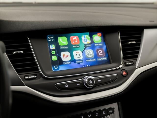 Opel ASTRA 1.4 Turbo Sport 150Pk Automaat (APPLE CARPLAY, GROOT NAVI, CLIMATE, LM VELGEN, SPORTSTOELEN, TREKHAAK, PARKEERSENSOREN, NIEUWE APK, NIEUWSTAAT)