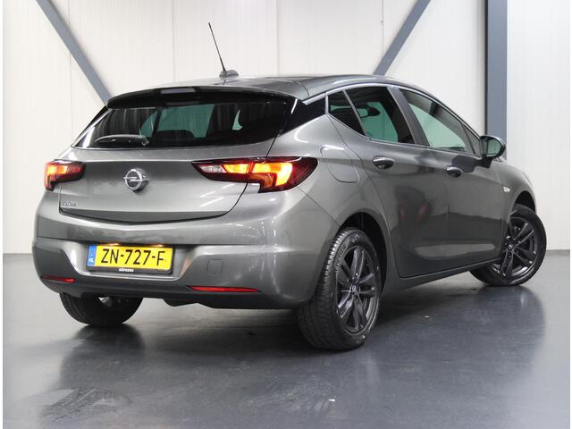 Opel ASTRA 150PK 120 Jaar Edition | 1ste eigenaar | AppleCarPlay/AndroidAuto | Climate Control | Parkeersensoren VOOR+Achter | Navigatie | Privacy Glass | AUTOMAAT | Isofix | LMV |