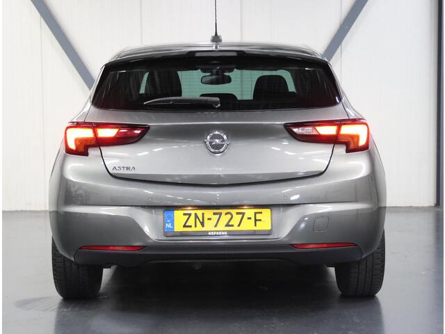 Opel ASTRA 150PK 120 Jaar Edition | 1ste eigenaar | AppleCarPlay/AndroidAuto | Climate Control | Parkeersensoren VOOR+Achter | Navigatie | Privacy Glass | AUTOMAAT | Isofix | LMV |