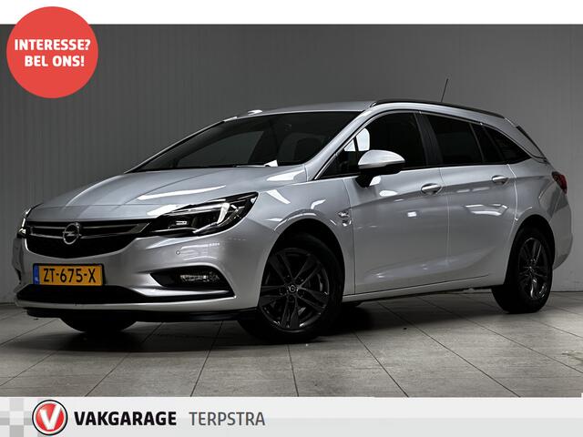 Opel ASTRA Sports Tourer 1.0 Turbo 120 Jaar Edition /Apple + Android /DAB+! /Navi /Climat /Cruise /Elek. pakket /Bluetooth /Regensensor /16"LMV /Extra getint glas /PDC V+A /LED Dagrijverl. /Dakrails.