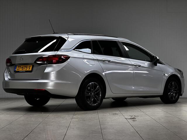 Opel ASTRA Sports Tourer 1.0 Turbo 120 Jaar Edition /Apple + Android /DAB+! /Navi /Climat /Cruise /Elek. pakket /Bluetooth /Regensensor /16"LMV /Extra getint glas /PDC V+A /LED Dagrijverl. /Dakrails.