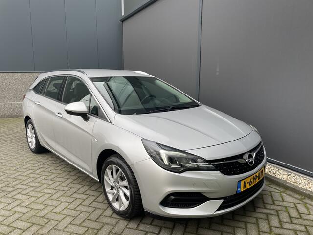 Opel ASTRA Sports Tourer 1.2 Business Elegance Airco - Cruise control - Parkeersensoren voor en achter - Achteruitrijcamera - Navigatie - Bluetooth - Keyless start and entry - Start/stop systeem - Stuur leder - Stuur multifunctioneel