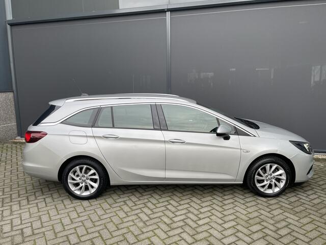 Opel ASTRA Sports Tourer 1.2 Business Elegance Airco - Cruise control - Parkeersensoren voor en achter - Achteruitrijcamera - Navigatie - Bluetooth - Keyless start and entry - Start/stop systeem - Stuur leder - Stuur multifunctioneel