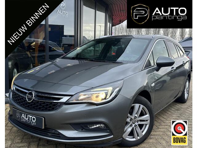 Opel ASTRA Sports Tourer 1.4 Turbo 120 Jaar Edition 150PK | AUTOMAAT | ZEER NETTE STAAT | Trekhaak | Stoel en Stuur Verwarming | APK tot 29-04-2027 |
