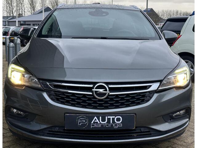 Opel ASTRA Sports Tourer 1.4 Turbo 120 Jaar Edition 150PK | AUTOMAAT | ZEER NETTE STAAT | Trekhaak | Stoel en Stuur Verwarming | APK tot 29-04-2027 |