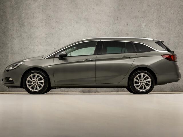 Opel ASTRA Sports Tourer 1.0 Innovation Sport (APPLE CARPLAY, GROOT NAVI, CLIMATE, LEDER, GETINT GLAS, SPORTSTOELEN, CAMERA, LM VELGEN, LED KOPLAMPEN, NIEUWSTAAT)