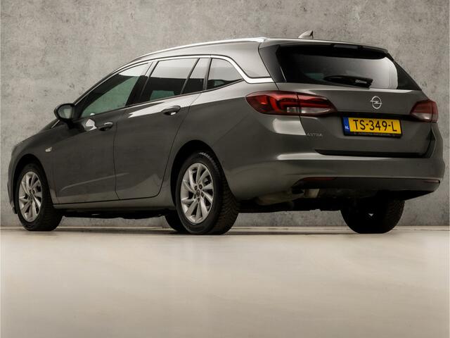 Opel ASTRA Sports Tourer 1.0 Innovation Sport (APPLE CARPLAY, GROOT NAVI, CLIMATE, LEDER, GETINT GLAS, SPORTSTOELEN, CAMERA, LM VELGEN, LED KOPLAMPEN, NIEUWSTAAT)