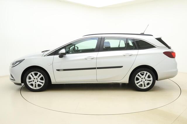 Opel ASTRA Sports Tourer 1.0 Turbo Business+ | 105PK | Trekhaak | Navigatie | Bluetooth | Airco | Cruise Control | Armsteun | Regensensor |
