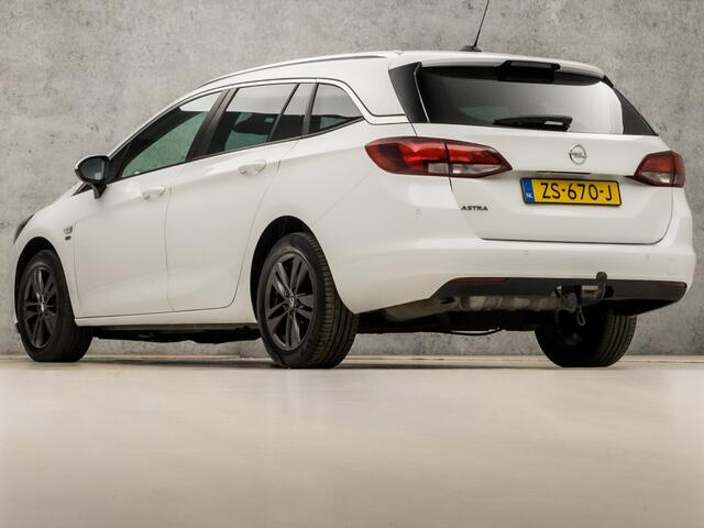 Opel ASTRA Sports Tourer 1.0 Turbo 120 Jaar Edition (APPLE CARPLAY, NAVIGATIE, CLIMATE, LED KOPLAMPEN, SPORTSTOELEN, CRUISE, PARKEERSENSOREN, GETINT GLAS, LM VELGEN, NIEUWSTAAT)