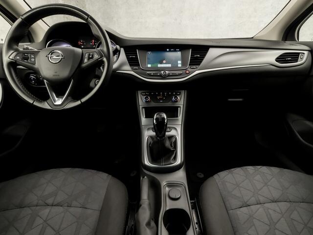 Opel ASTRA Sports Tourer 1.0 Turbo 120 Jaar Edition (APPLE CARPLAY, NAVIGATIE, CLIMATE, LED KOPLAMPEN, SPORTSTOELEN, CRUISE, PARKEERSENSOREN, GETINT GLAS, LM VELGEN, NIEUWSTAAT)