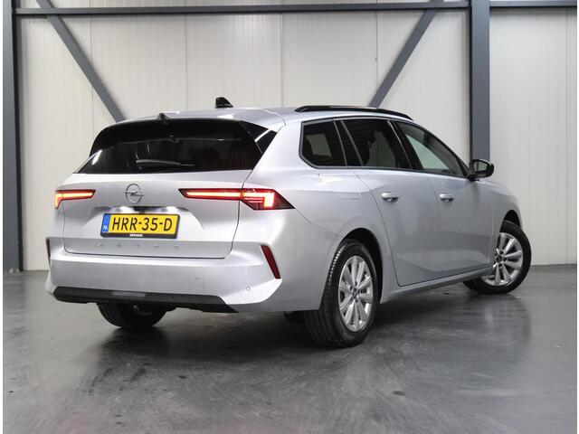 Opel ASTRA Sports Tourer 1.2 Business Edition 110PK | 1ste eigenaar | Navigatie | Climate Control | Adaptieve Cruise Control | Achteruitrijcamera | Parkeersensoren Voor + Achter | 16" Lichtmetalen Velgen | Verwarmbare Voorstoelen | Keyless Entry/Start | AppleCarplay