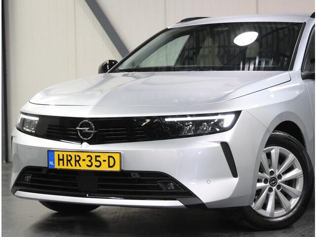 Opel ASTRA Sports Tourer 1.2 Business Edition 110PK | 1ste eigenaar | Navigatie | Climate Control | Adaptieve Cruise Control | Achteruitrijcamera | Parkeersensoren Voor + Achter | 16" Lichtmetalen Velgen | Verwarmbare Voorstoelen | Keyless Entry/Start | AppleCarplay