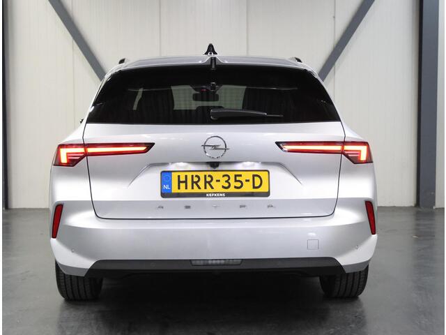 Opel ASTRA Sports Tourer 1.2 Business Edition 110PK | 1ste eigenaar | Navigatie | Climate Control | Adaptieve Cruise Control | Achteruitrijcamera | Parkeersensoren Voor + Achter | 16" Lichtmetalen Velgen | Verwarmbare Voorstoelen | Keyless Entry/Start | AppleCarplay