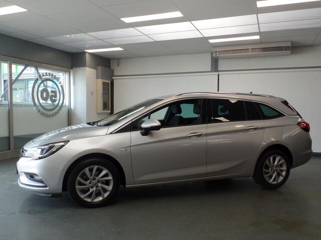 Opel ASTRA Sports Tourer 1.0 Turbo Innovation Navigatie, Achteruitrijcamera, Elek achterklep, Clima controle, Cruise controle, Elek ramen/Spiegels, Deels leder, Xenon, Pdc V/A, Lm velgen 16'', Nederlandse auto!! Bovag afleverpakket 695,-