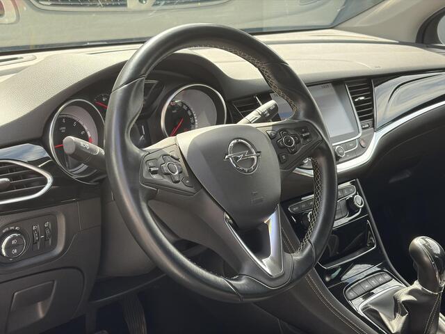 Opel ASTRA Sports Tourer 1.4 Innovation 2e Eigenaar,Navi,Camera,Trekhaak,150pk,Keyless,N.A.P,6 Bak,Pdc V+A,Halfleder,Clima,Cruise,Dodehoek,Lm velgen,Apk tot 03-2027