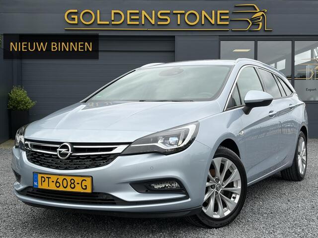 Opel ASTRA Sports Tourer 1.4 Innovation 2e Eigenaar,150pk,Carplay,Clima,Cruise,6 Bak,Keyless,Halfleder,Comfortstoelen,Rijstrooksensor,Elekt.Stoelen,Lm velgen,PDC V+A,N.A.P,Nieuwe Apk bij Aflevering