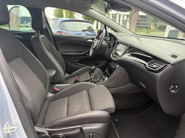 Opel ASTRA Sports Tourer 1.4 Innovation 2e Eigenaar,150pk,Carplay,Clima,Cruise,6 Bak,Keyless,Halfleder,Comfortstoelen,Rijstrooksensor,Elekt.Stoelen,Lm velgen,PDC V+A,N.A.P,Nieuwe Apk bij Aflevering