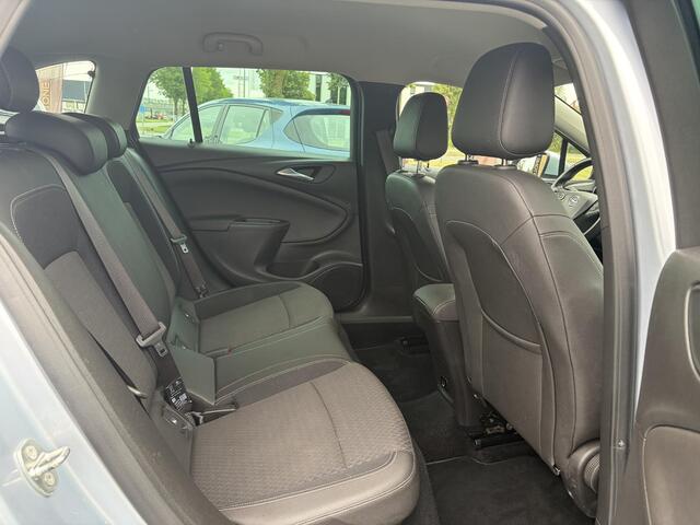 Opel ASTRA Sports Tourer 1.4 Innovation 2e Eigenaar,150pk,Carplay,Clima,Cruise,6 Bak,Keyless,Halfleder,Comfortstoelen,Rijstrooksensor,Elekt.Stoelen,Lm velgen,PDC V+A,N.A.P,Nieuwe Apk bij Aflevering