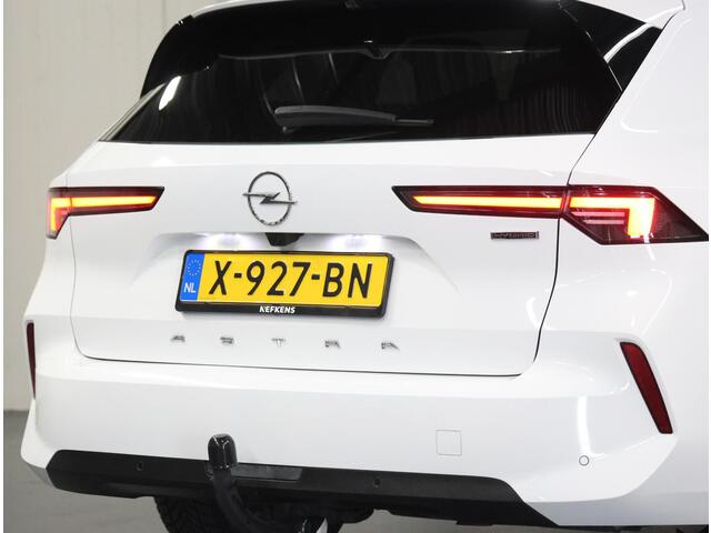 Opel ASTRA ST 180PK Hybrid | 1ste eigenaar | Trekhaak | Camera | Stuur/stoelverwarming | Adaptive Cruise Control | AppleCarPlay/Android | AUTOMAAT | Isofix | Privacy Glass | Parkeersensoren |