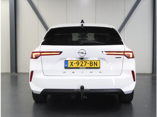 Opel ASTRA ST 180PK Hybrid | 1ste eigenaar | Trekhaak | Camera | Stuur/stoelverwarming | Adaptive Cruise Control | AppleCarPlay/Android | AUTOMAAT | Isofix | Privacy Glass | Parkeersensoren |