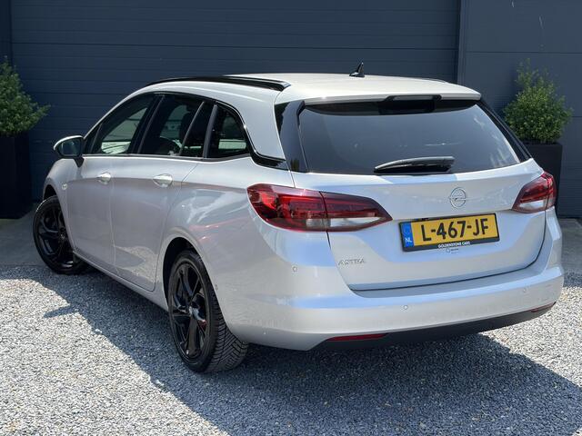 Opel ASTRA Sports Tourer 1.2 Ultimate 146pk,Camera,Keyless,Carplay,6 Bak,Afn Trekhaak,Stoelverw,Lm velgen,Alcantara-Leder,Dealer Onderhouden,Clima,Cruise,Dodehoek,Rijstrooksensor,N.A.P,PDc V+A,Apk tot 07-2028