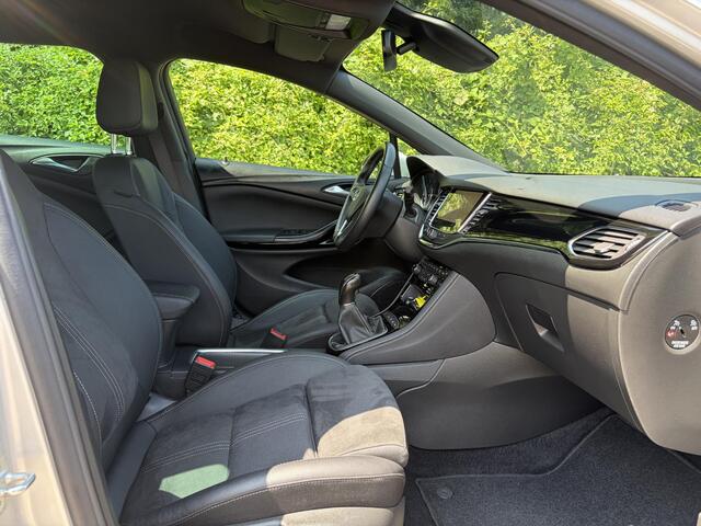 Opel ASTRA Sports Tourer 1.2 Ultimate 146pk,Camera,Keyless,Carplay,6 Bak,Afn Trekhaak,Stoelverw,Lm velgen,Alcantara-Leder,Dealer Onderhouden,Clima,Cruise,Dodehoek,Rijstrooksensor,N.A.P,PDc V+A,Apk tot 07-2028