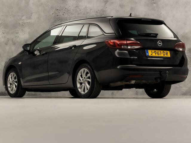 Opel ASTRA Sports Tourer 1.2 Elegance Sport (APPLE CARPLAY, GROOT NAVI, CLIMATE, CAMERA, TREKHAAK, SPORTSTOELEN, GETINT GLAS, KEYLESS, ADAPTIVE CRUISE, NIEUWSTAAT)