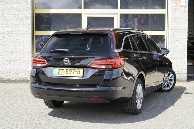 Opel ASTRA Sports Tourer 1.4 Turbo 150PK! Innovation BJ2019 Lmv 16" | Led | Keyless entry | Pdc | Navi | Elek. achterklep | Achteruitrijcamera | App-Connect | Climate control | Cruise control | Sportstoelen | Extra getint glas