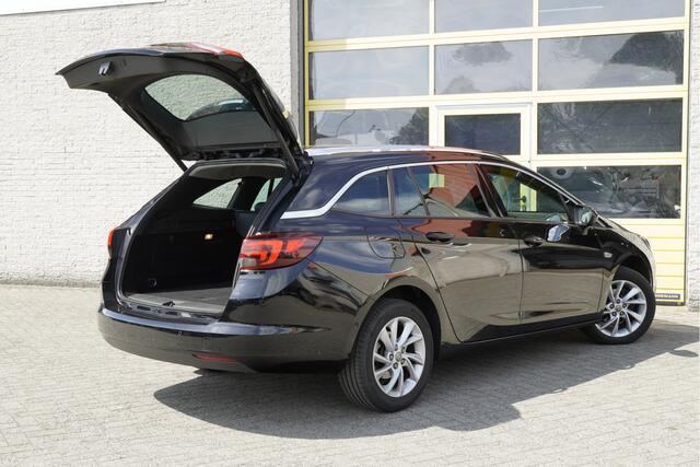 Opel ASTRA Sports Tourer 1.4 Turbo 150PK! Innovation BJ2019 Lmv 16" | Led | Keyless entry | Pdc | Navi | Elek. achterklep | Achteruitrijcamera | App-Connect | Climate control | Cruise control | Sportstoelen | Extra getint glas