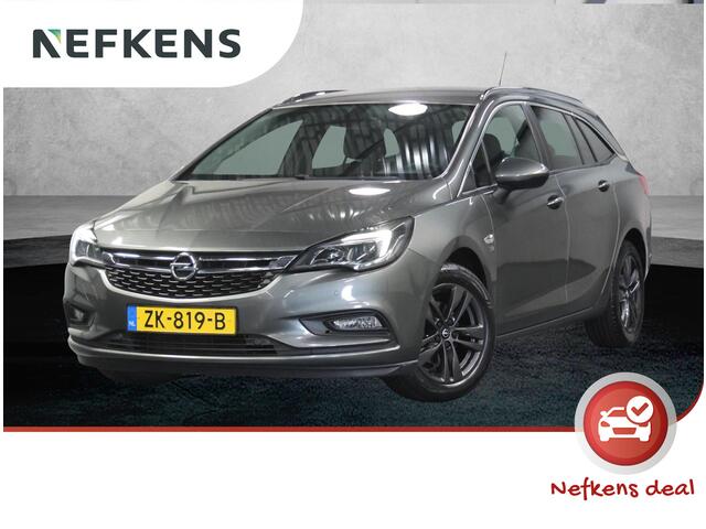 Opel ASTRA ST 105PK 120 Jaar Edition | 1ste eigenaar | Camera | Trekhaak | AppleCarPlay/Android | Armsteun | AGR stoelen | Navigatie | Climate Control | Cruise Control | Isofix | Privacy Glass | Parkeersensoren |