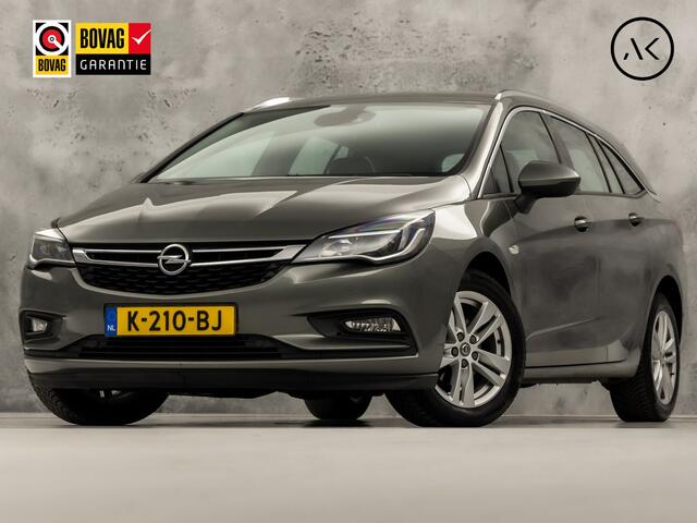 Opel ASTRA Sports Tourer 1.4 Turbo Innovation Sport 150Pk Automaat (APPLE CARPLAY, NAVIGATIE, CAMERA, STUUR/STOELVERWARMING, SPORTSTOELEN, ADAPTIVE CRUISE, LM VELGEN, NIEUWSTAAT)