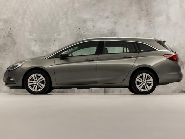 Opel ASTRA Sports Tourer 1.4 Turbo Innovation Sport 150Pk Automaat (APPLE CARPLAY, NAVIGATIE, CAMERA, STUUR/STOELVERWARMING, SPORTSTOELEN, ADAPTIVE CRUISE, LM VELGEN, NIEUWSTAAT)