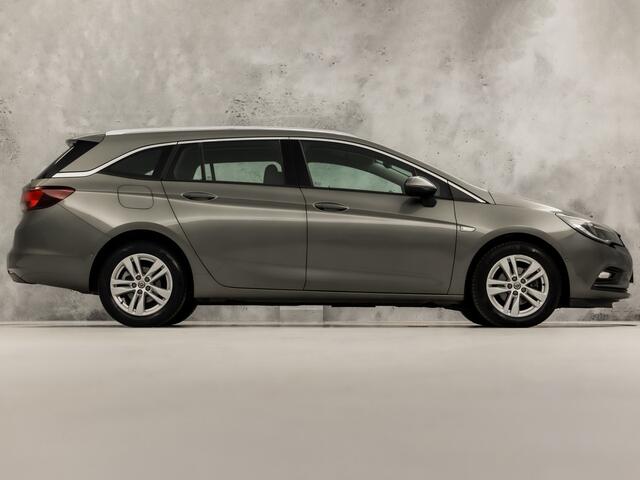 Opel ASTRA Sports Tourer 1.4 Turbo Innovation Sport 150Pk Automaat (APPLE CARPLAY, NAVIGATIE, CAMERA, STUUR/STOELVERWARMING, SPORTSTOELEN, ADAPTIVE CRUISE, LM VELGEN, NIEUWSTAAT)